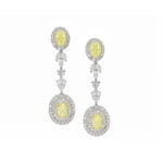 Elegant earrings featuring oval yellow diamonds, along with pear-shaped, marquise-cut, and round white diamonds.