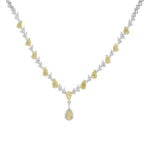 Necklace featuring pear-shaped yellow and white diamonds.